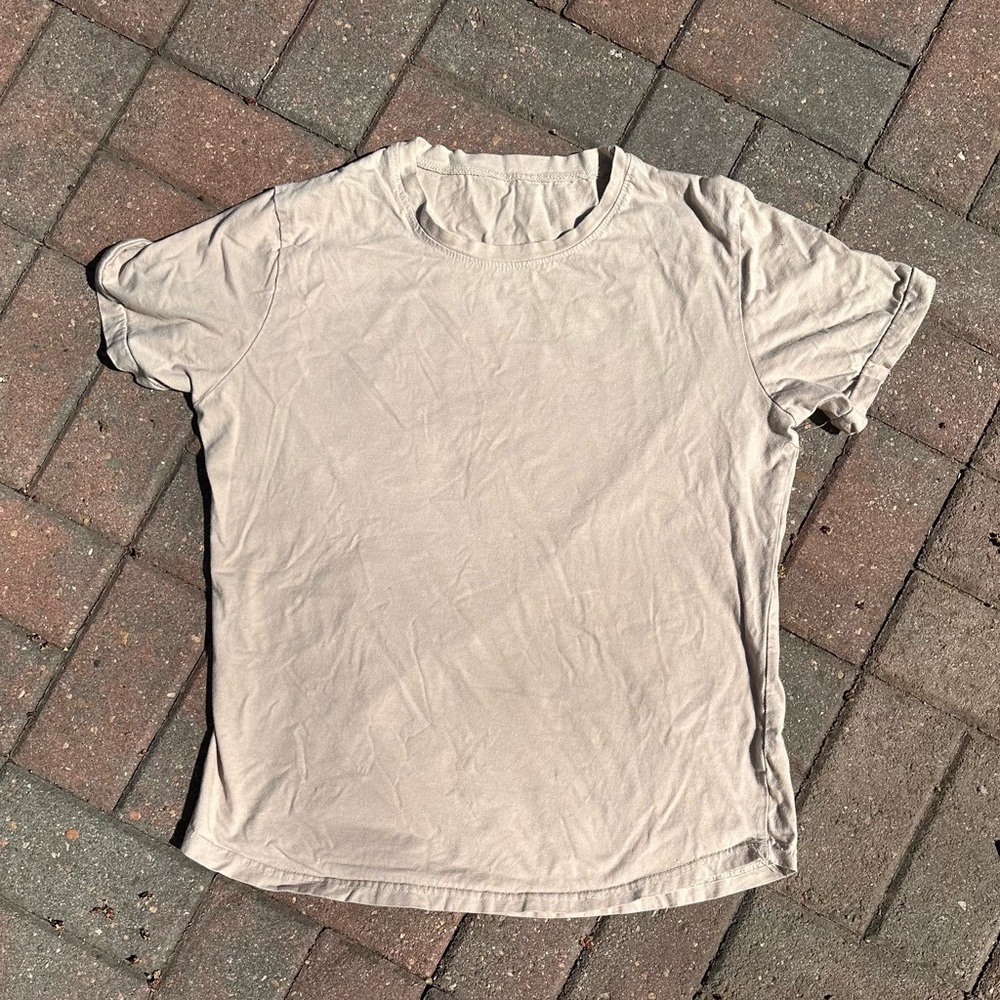 Tan tee